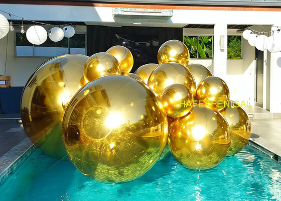 Gold, Black, And Red Inflatable Pvc Mirror Balloons As Water Art Installation